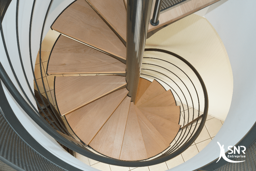 Création-dun-escalier-bois-métal-sur-mesure-avec-trémie-circulaire-par-SNR-Entreprise