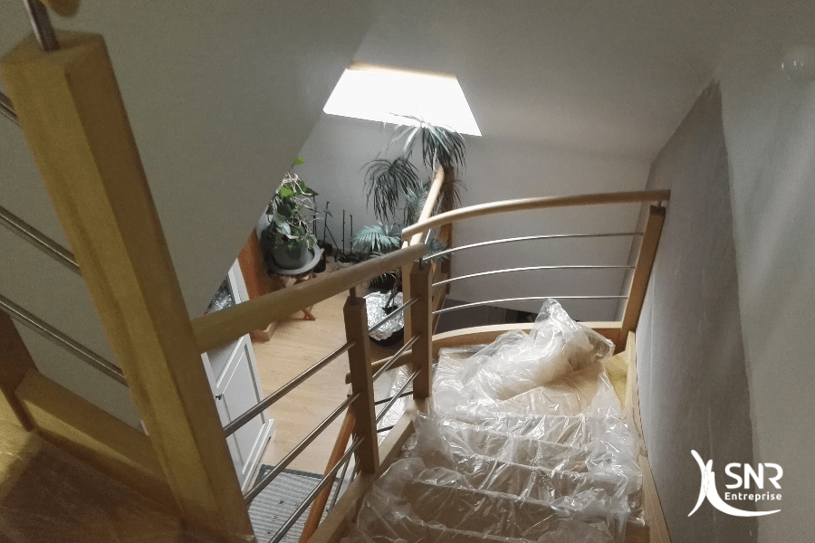Pose-d-un-escalier-sur-mesure-pour-un-projet-d-aménagement-de-combles-saint-malo